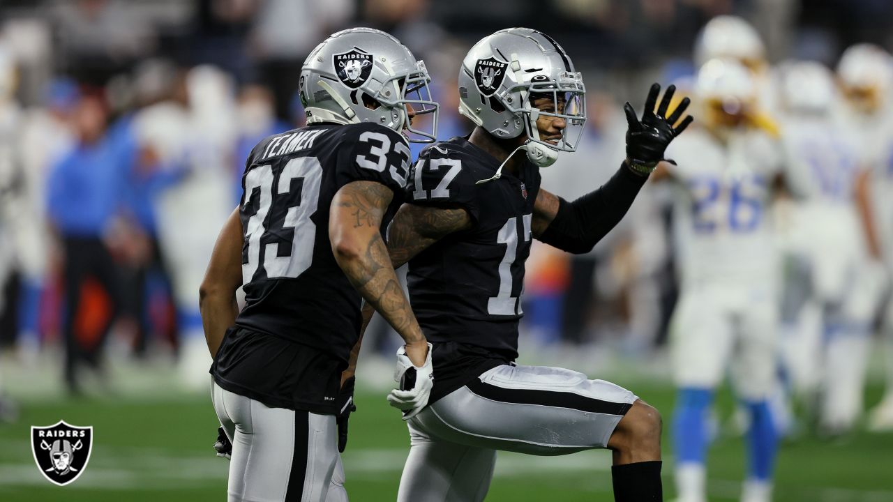 Raiders wide receiver Tyron Johnson (17) celebrates as time