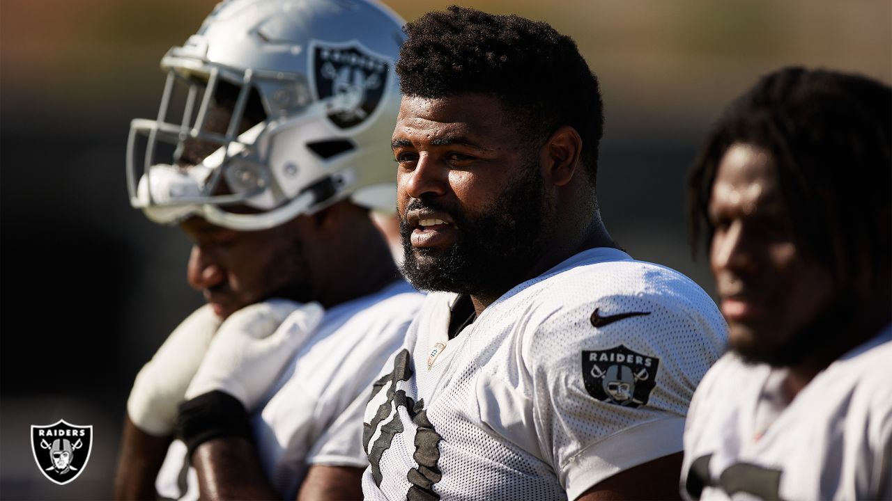 Oakland Raiders defensive tackle Johnathan Hankins (90) stretches during  the NFL team's joint t …