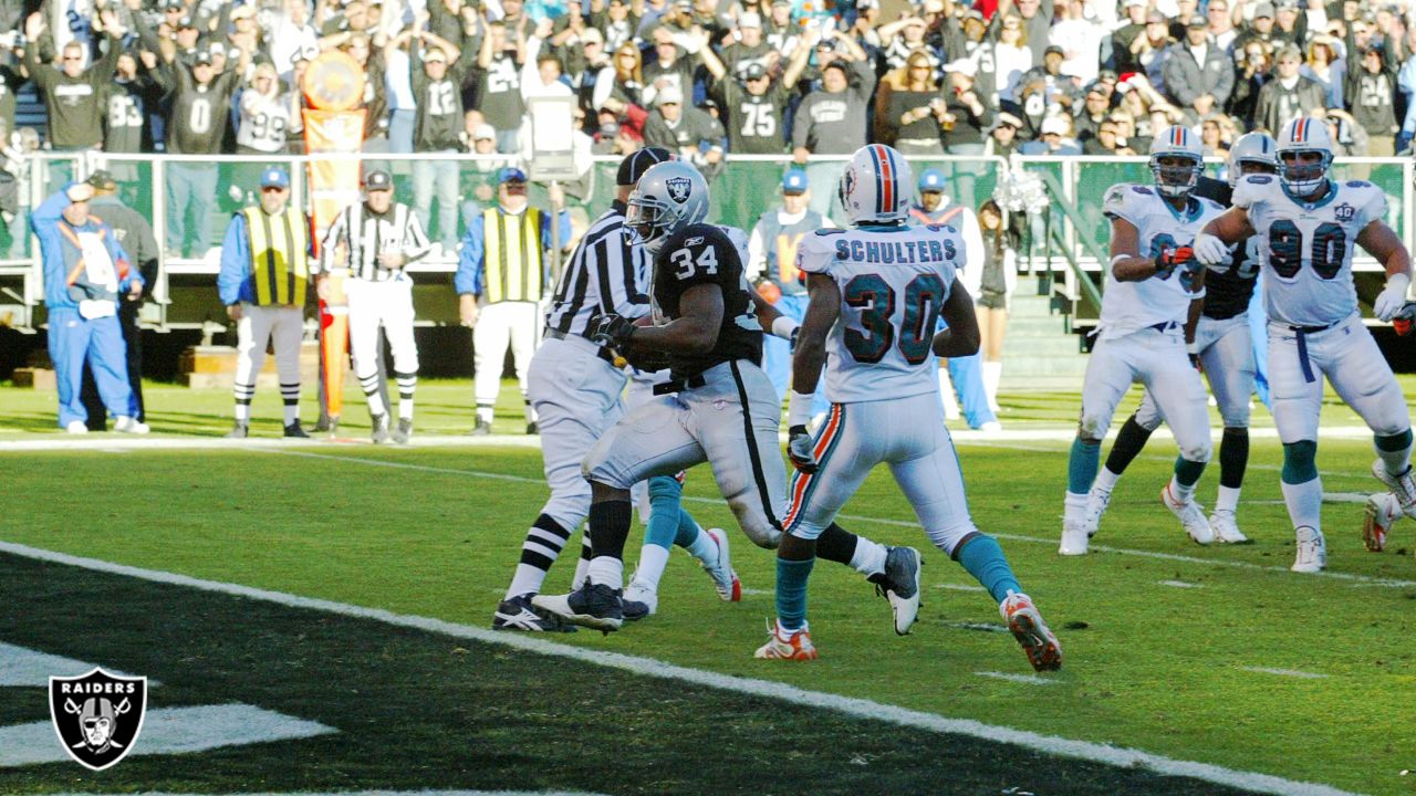 Oakland, California, USA. 27th Nov, 2005. Miami Dolphins running