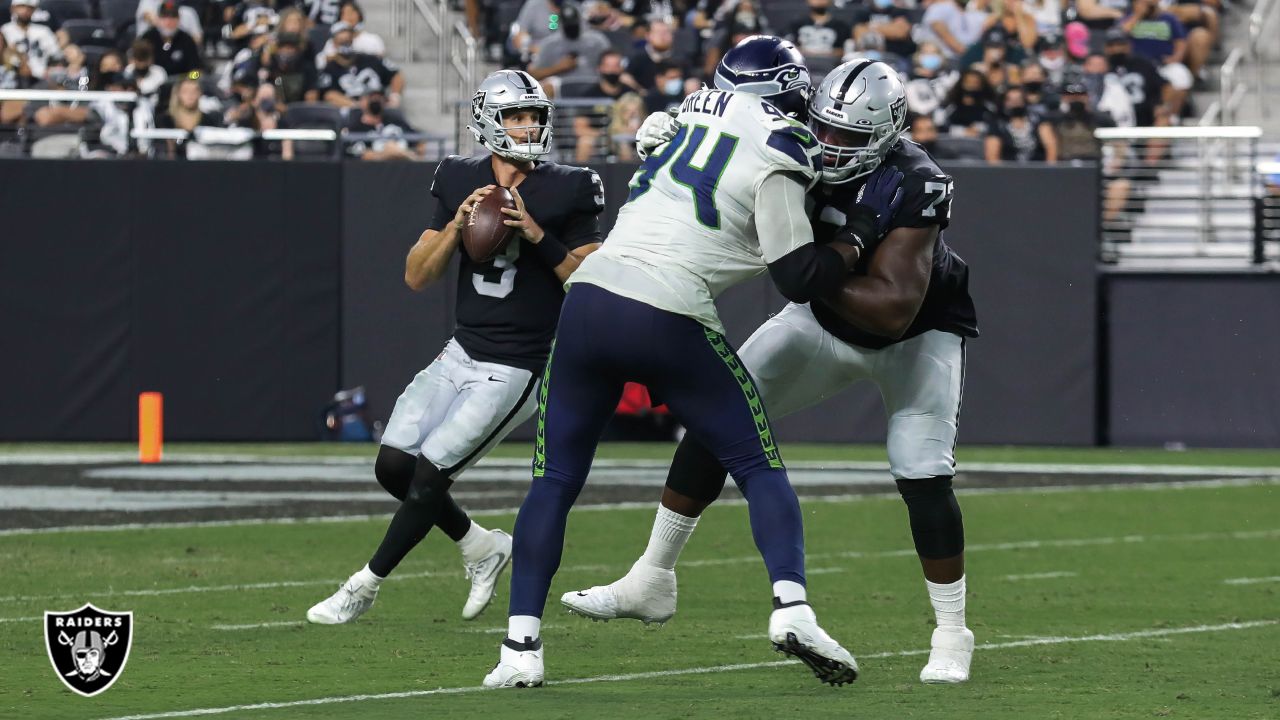 Las Vegas Raiders quarterback Nathan Peterman (3) looks to pass against  Seattle Seahawks during the first