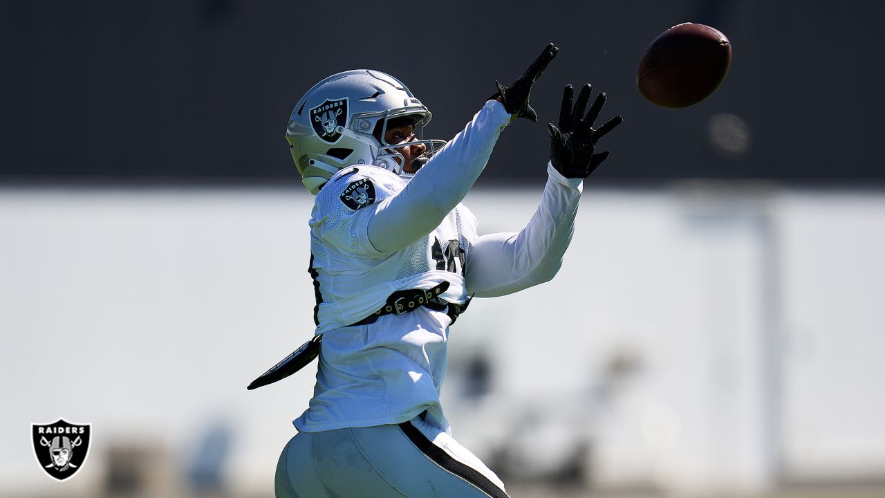 Las Vegas Raiders wide receiver DJ Turner runs with the ball during the  first half of an NFL football game against the Houston Texans Sunday, Oct.  23, 2022, in Las Vegas. (AP