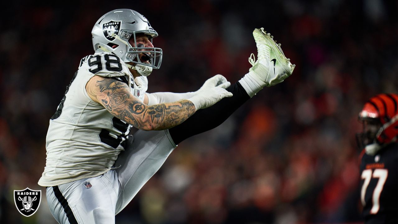 Las Vegas Raiders defensive end Maxx Crosby (98) celebrates after a big  defensive stop in the f …