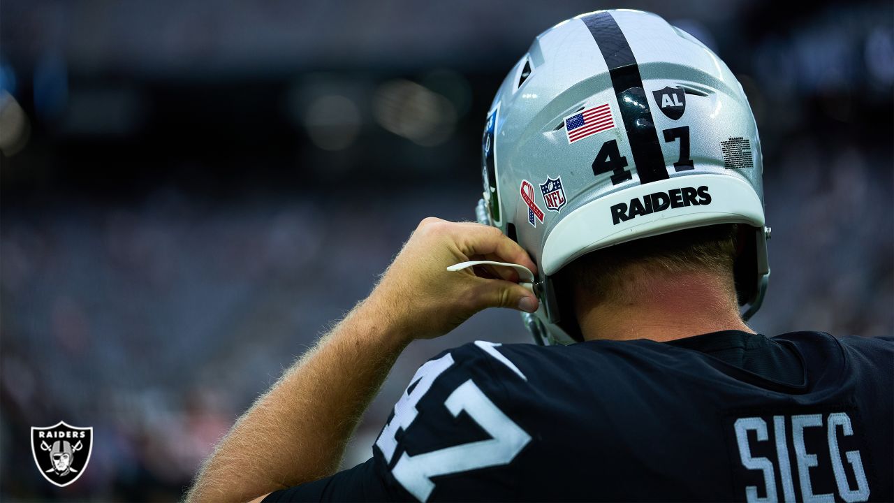 Las Vegas Raiders guard Jordan Simmons (60) looks out from the