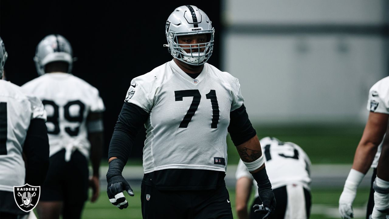 Las Vegas Raiders offensive tackles Sam Young (70), Brandon Parker (75) and  Denzelle Good (71) …