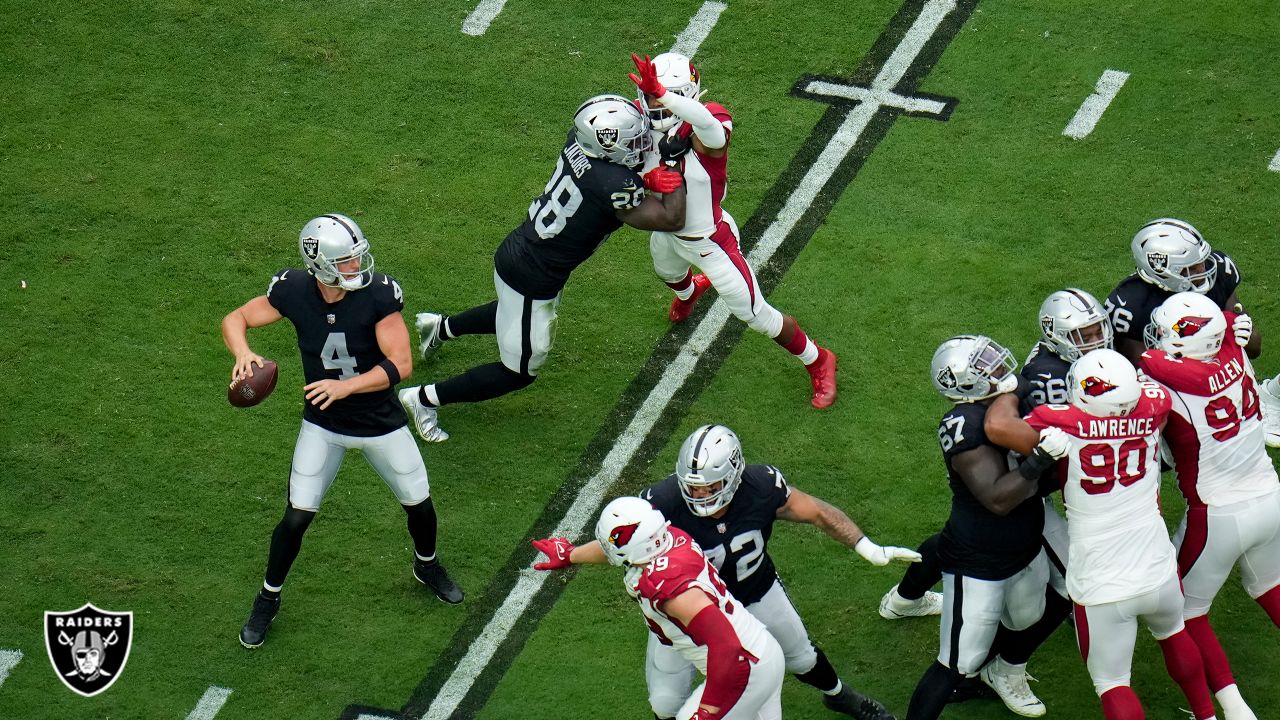 Las Vegas Raiders quarterback Derek Carr (4) calls the play out during the  first half of an NFL football game against the Arizona Cardinals, Sunday,  Sept. 18, 2022, in Las Vegas. (AP