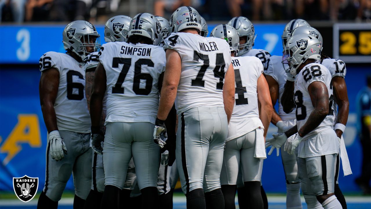 Los Angeles Chargers huddle during an NFL football game against