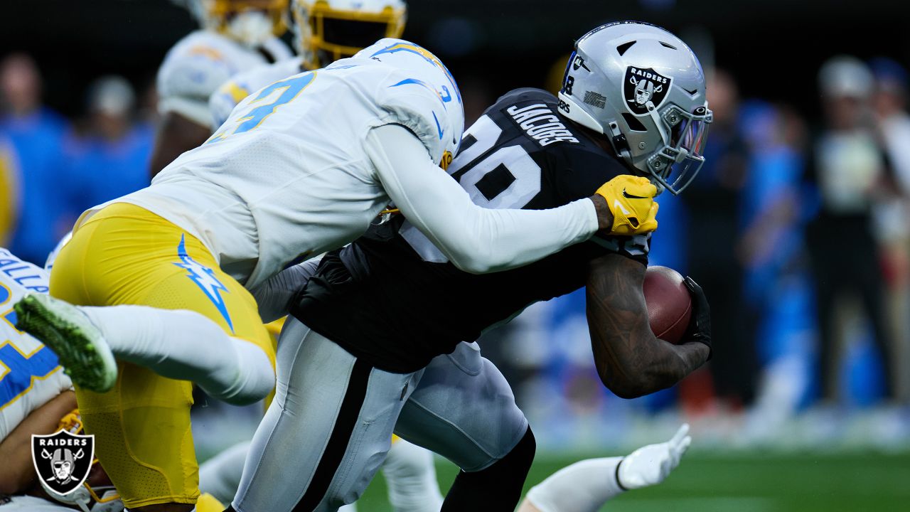 Oakland Raiders tackle Kolton Miller (77) blocks against the Los Angeles  Chargers during an NFL football