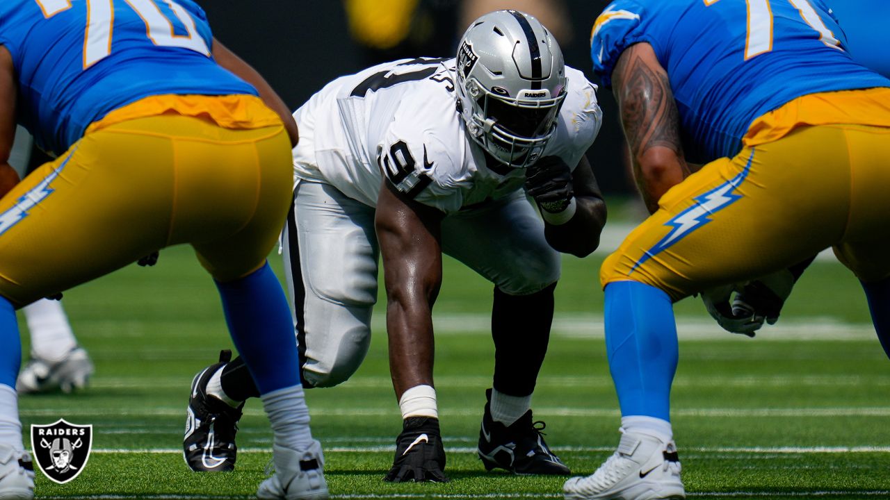 Las Vegas Raiders defensive tackle Bilal Nichols (91) reacts after a  touchdown against the Los Angeles Chargers during the first half of an NFL  football game, Sunday, Dec. 4, 2022, in Las