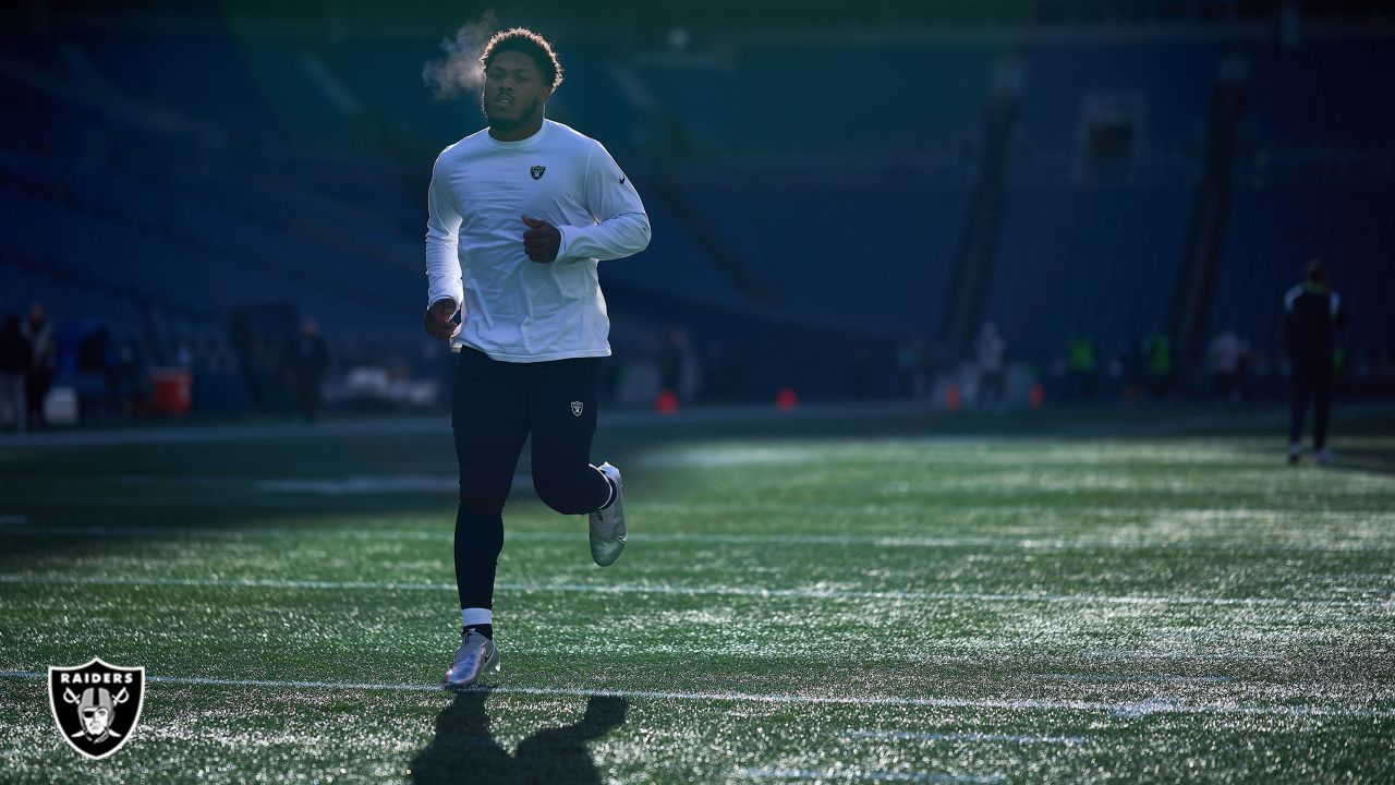 Oakland Raiders running back Josh Jacobs (28) warms up before an