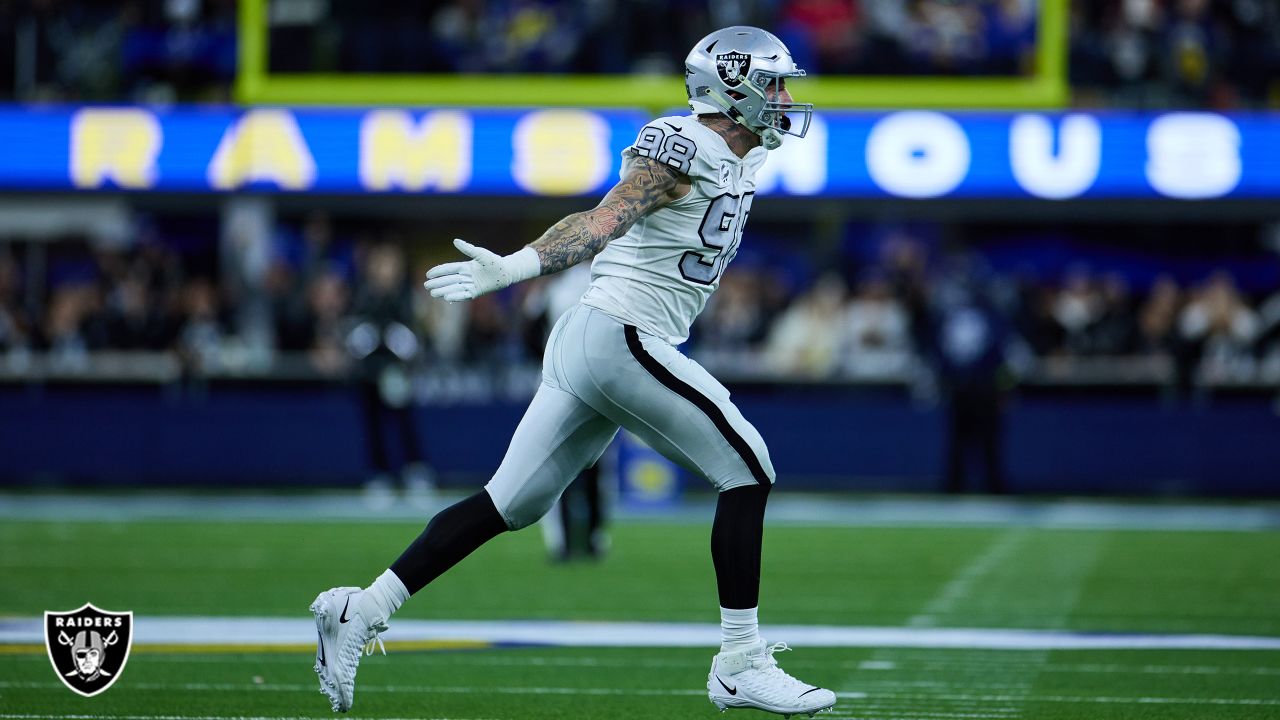 Las Vegas Raiders defensive end Maxx Crosby (98) celebrates after a big  defensive stop in the f …