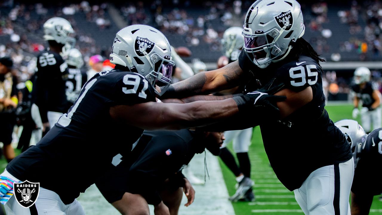 Las Vegas Raiders defensive tackle Kendal Vickers (95) stands on