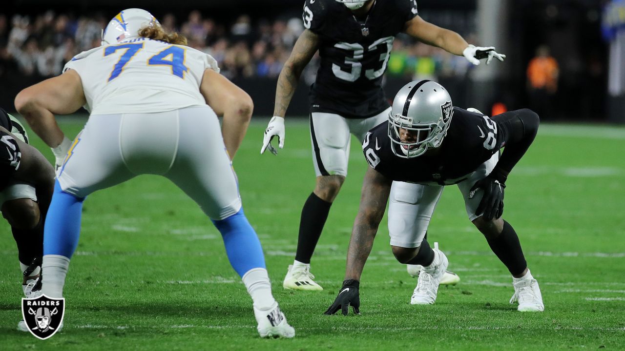 Las Vegas Raiders' Tyron Johnson (17) runs against the Los Angeles Chargers  during the first half of an NFL football game, Sunday, Jan. 9, 2022, in Las  Vegas. (AP Photo/Ellen Schmidt Stock