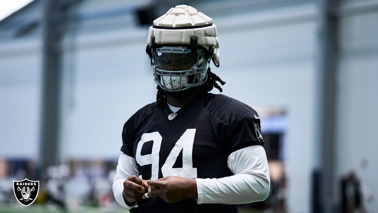 What are those funny-looking soft caps on NFL helmets during camp?, Sports