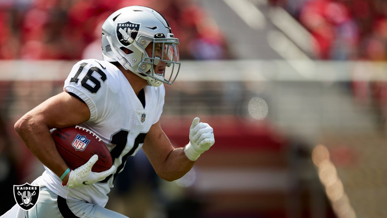 Las Vegas Raiders' Dillon Stoner (16) runs against San Francisco 49ers'  Elijah Mitchell an NFL …