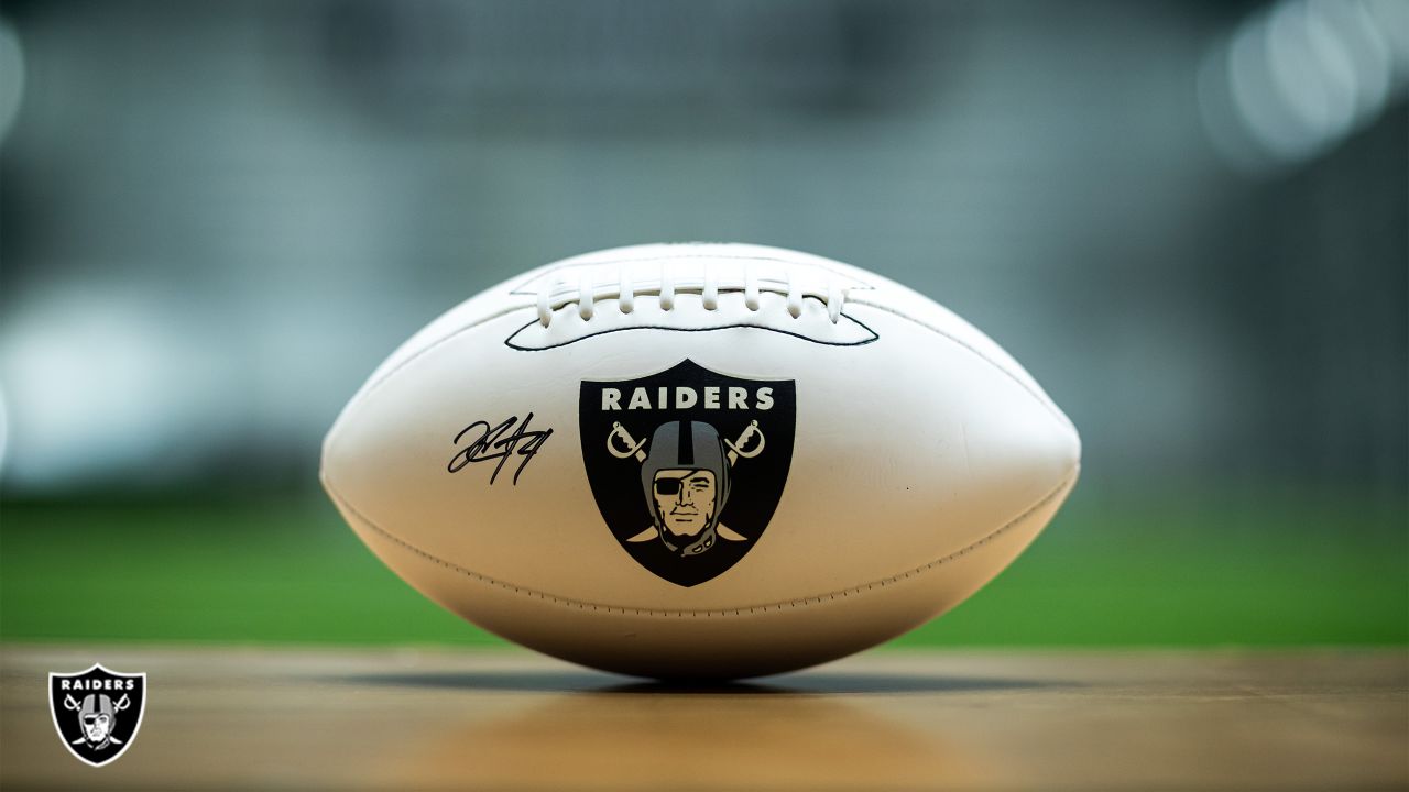 Carolina Panthers vs. Las Vegas Raiders. Fans support on NFL Game.  Silhouette of supporters, big screen with two rivals in background Stock  Photo - Alamy