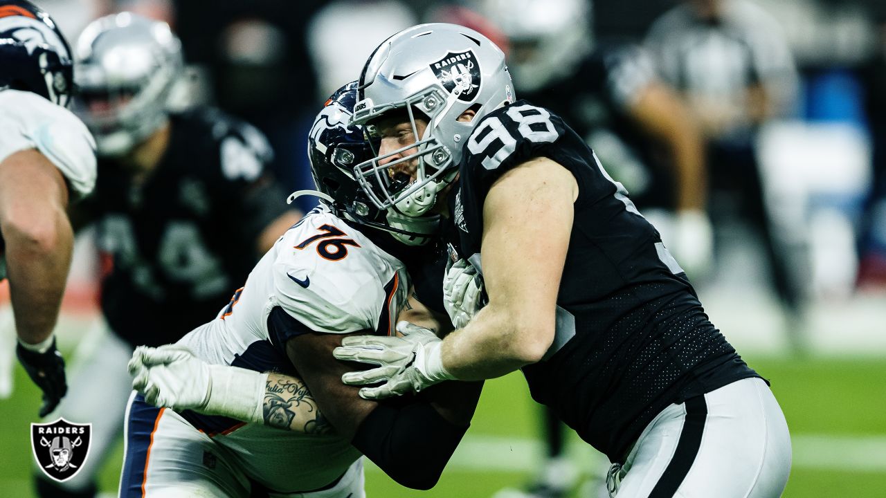 Las Vegas Raiders defensive end Carl Nassib (94) walks towards the sideline  before an NFL footb …