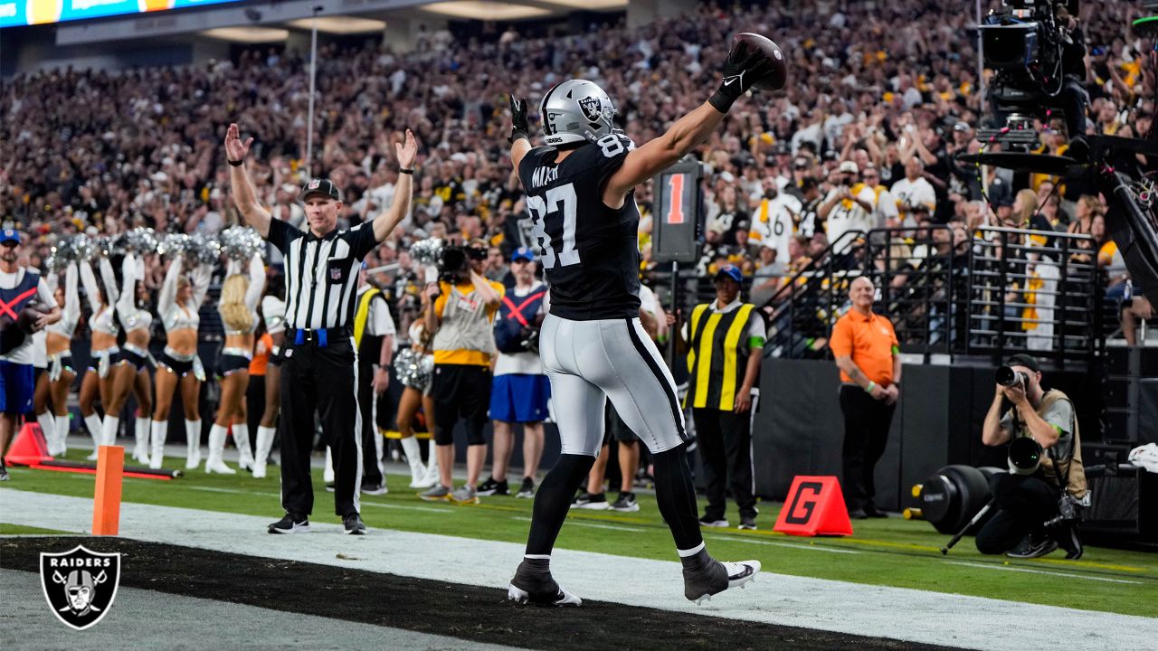 Raiders fans celebrate after beating the Pittsburgh Steelers at