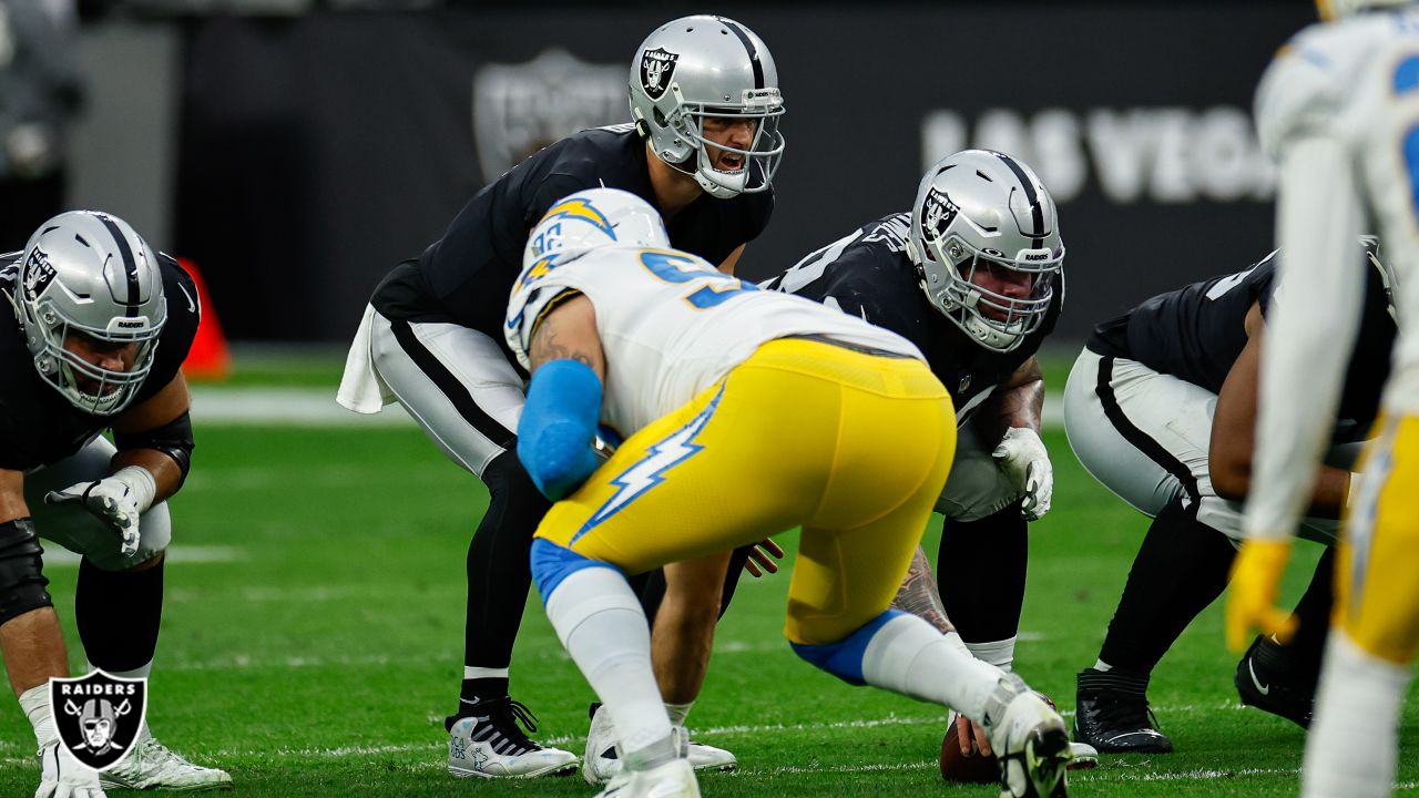 Los Angeles Chargers tight end Tre' McKitty (88) is tackled by Las Vegas  Raiders cornerback Nate Hobbs (39) during the first half of an NFL football  game, Sunday, Dec. 4, 2022, in