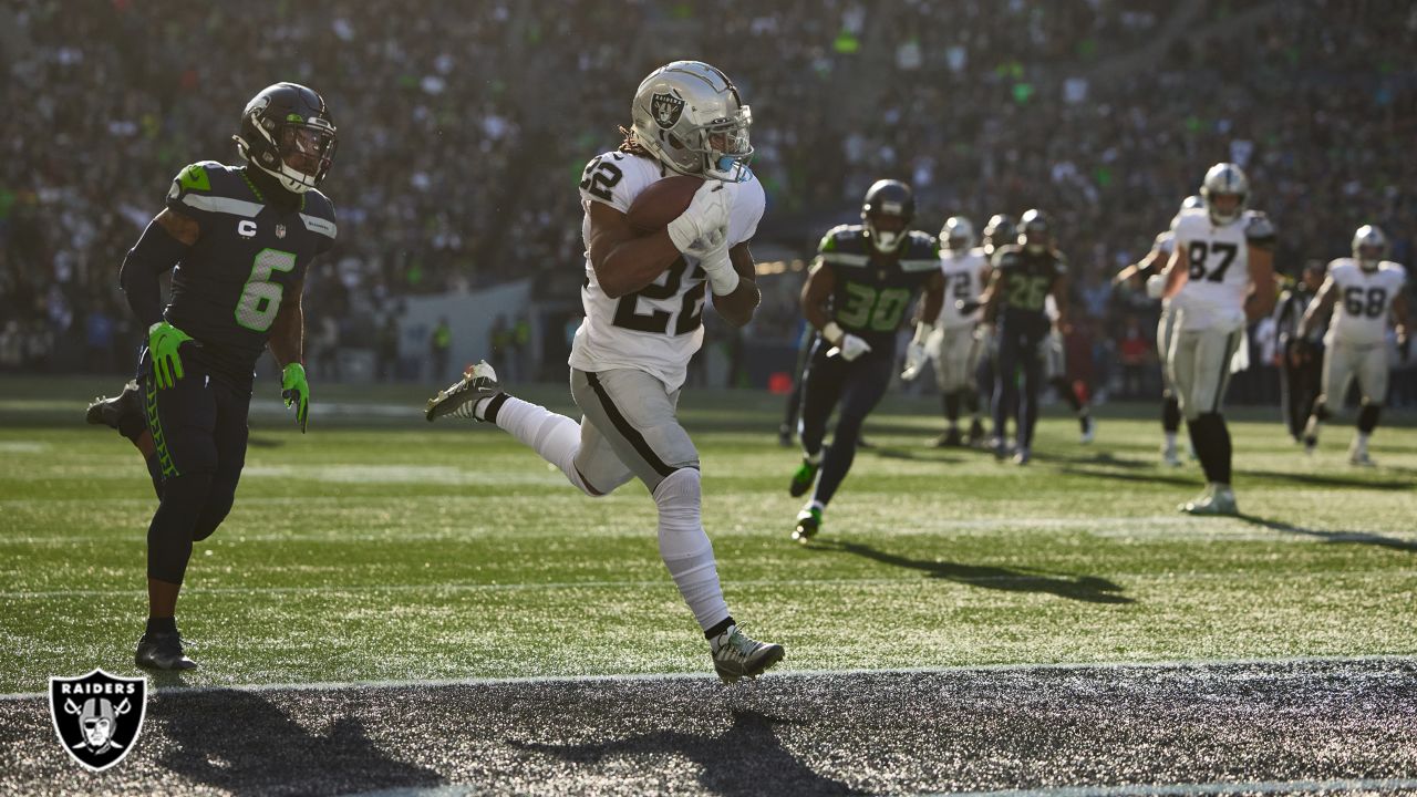 Las Vegas Raiders cornerback Amik Robertson (21) tackles Seattle Seahawks  tight end Cam Sutton (46) during the second half of an NFL preseason  football game, Saturday, Aug. 14, 2021, in Las Vegas. (