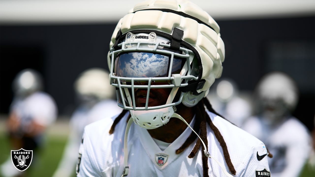 Las Vegas Raiders safety Jaquan Johnson (26) is seen during warm ups before  an NFL preseason football game against the Dallas Cowboys, Saturday, Aug.  26, 2023, in Arlington, Texas. Dallas won 31-16. (