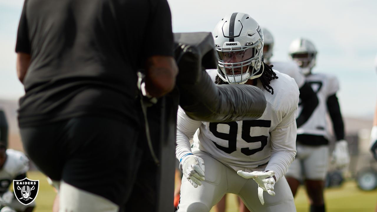 Las Vegas Raiders defensive tackle Kendal Vickers (95) stands on