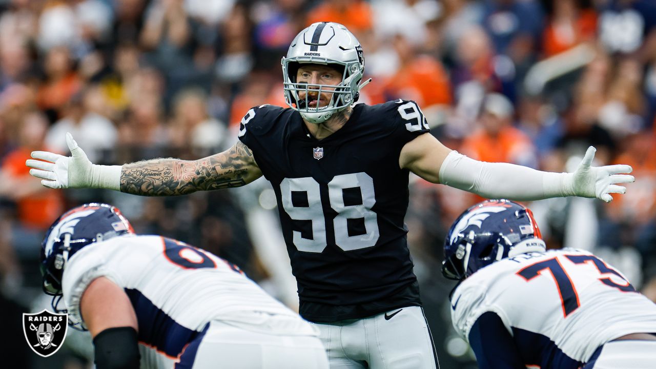 Las Vegas Raiders defensive end Maxx Crosby (98) celebrates after a big  defensive stop in the f …