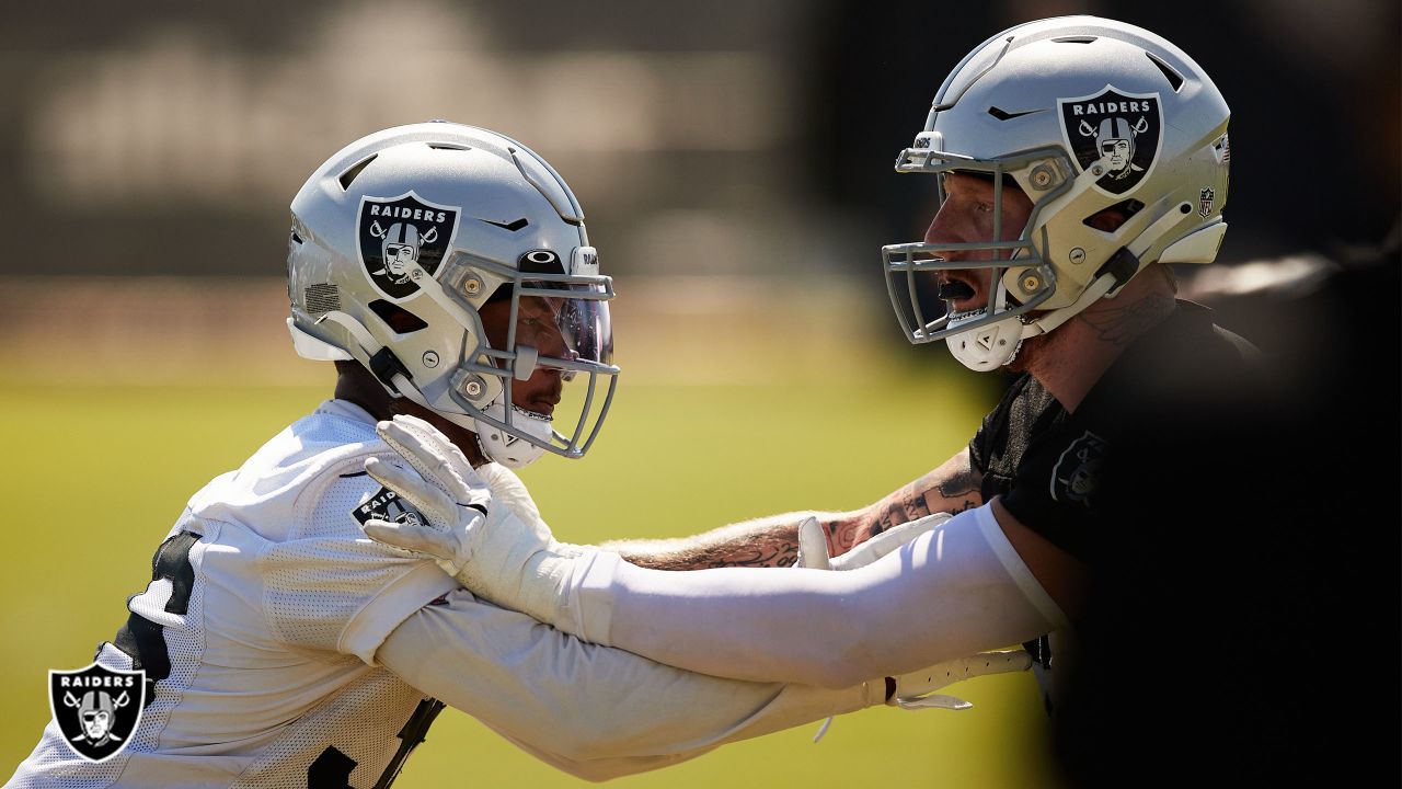 Las Vegas Raiders inside linebacker Cory Littleton (42) and Las Vegas  Raiders defensive back Johnathan Abram (24) talk to Pittsburgh Steelers  quarterback Ben Roethlisberger (7) after an NFL football game, Sunday, Sept.