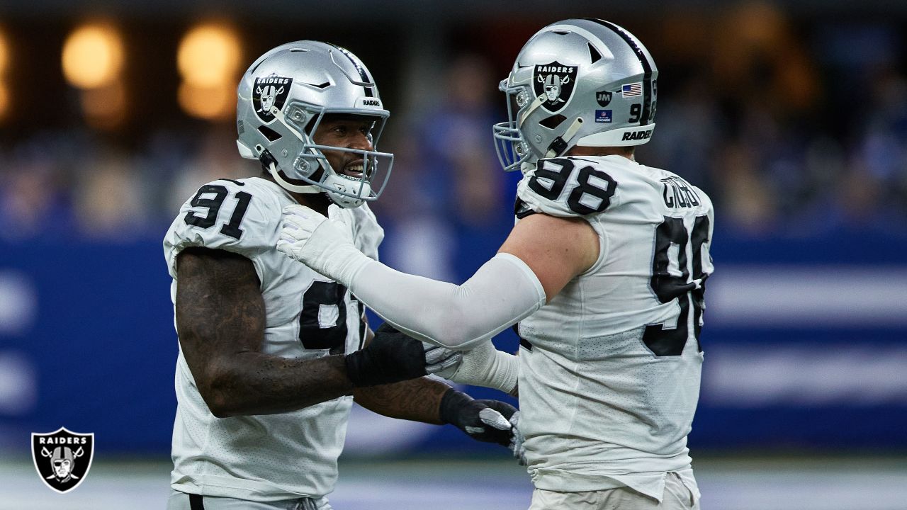 Indianapolis Colts safety Brandon Facyson (31) celebrates with Indianapolis  Colts defensive end Yannick Ngakoue (91) in