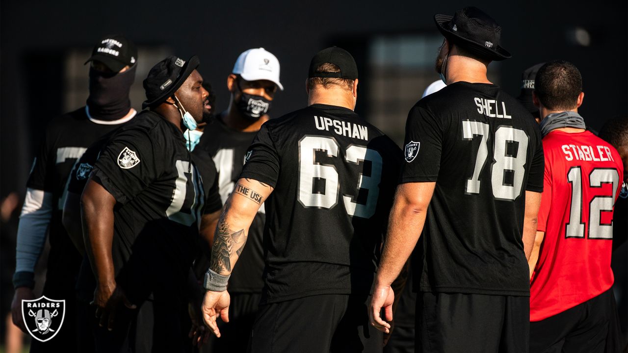 Victor Tayang wears his Oakland Raider gear before the Raiders first game  of the season against …