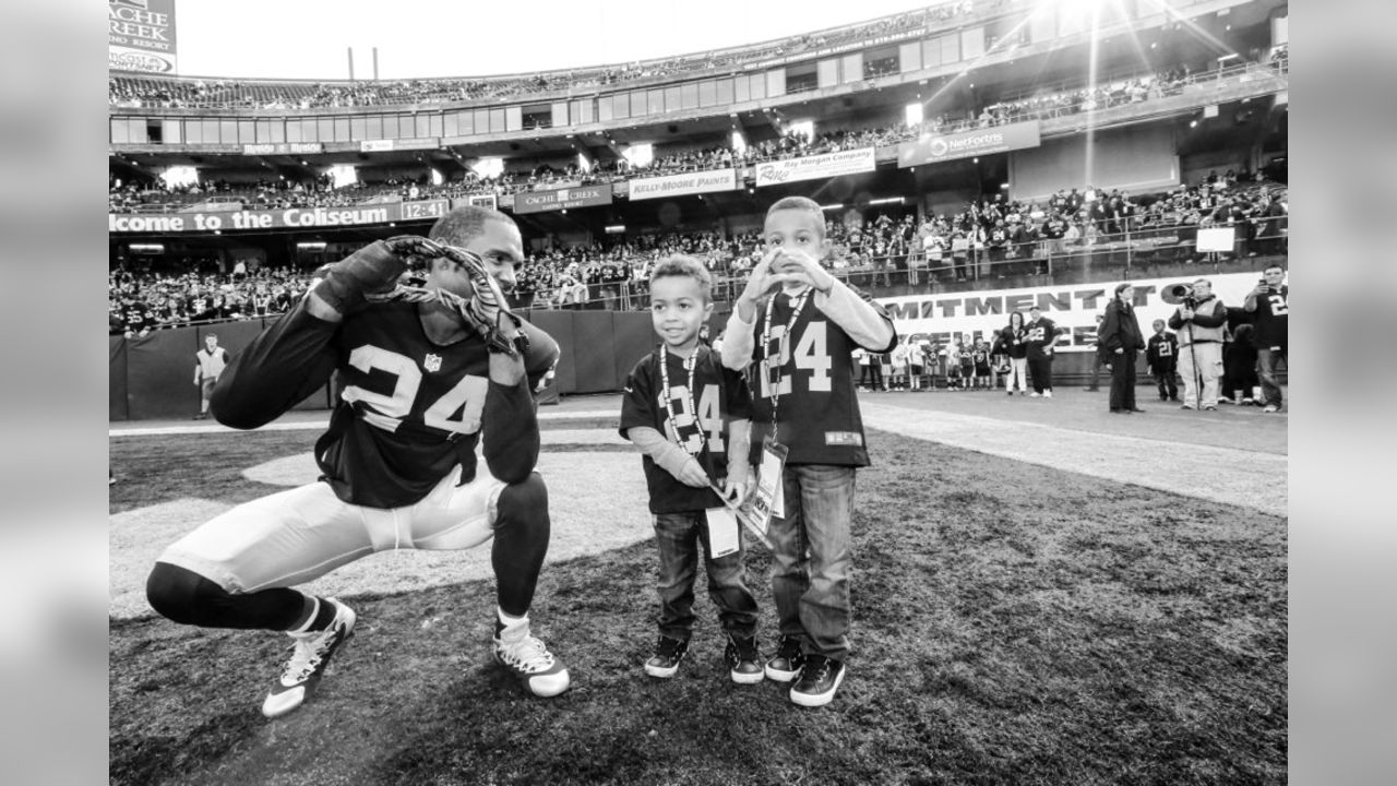 Charles Woodson celebrates an interception and a brief moment of success in  the first quarter with Tory James in Super Bowl XXXVII between the Oakland  Raiders and the Tampa Bay Buccaneers, January