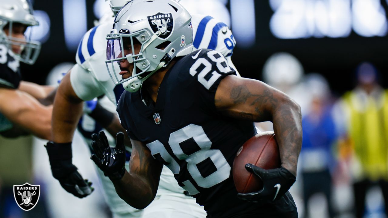 Las Vegas Raiders running back Josh Jacobs (28) runs the ball against the  Indianapolis Colts during the first half of an NFL football game, Sunday,  Nov 13, 2022, in Las Vegas. (AP