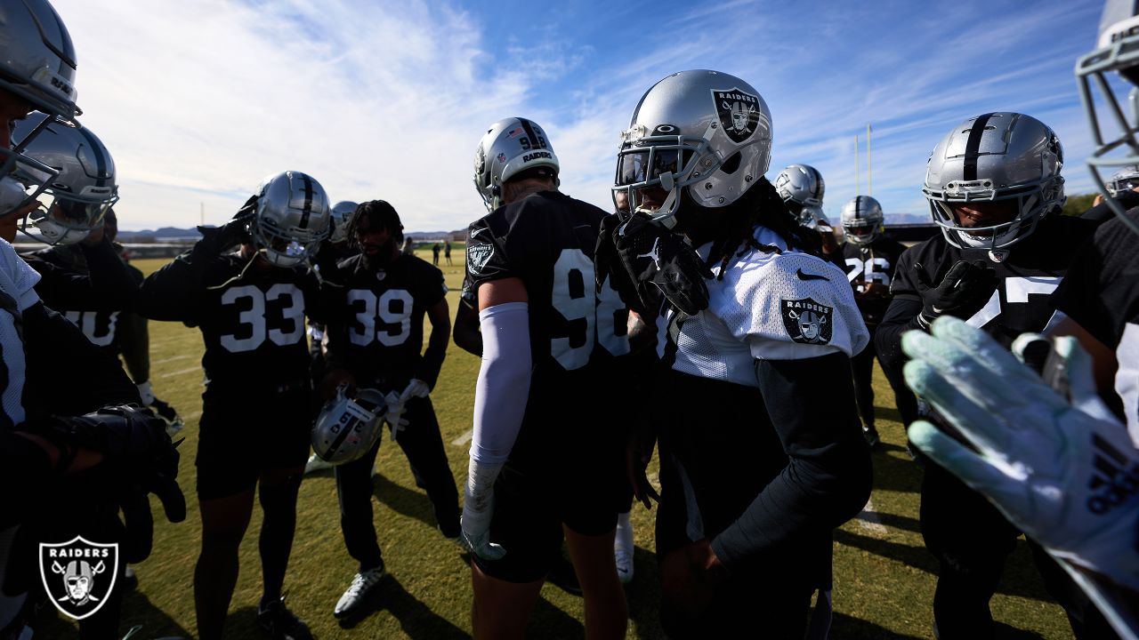 Las Vegas Raiders running back coach Kennedy Polamalu gives an