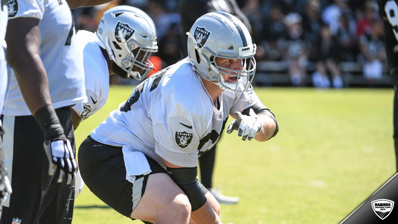 Oakland Raiders offensive guard Jordan Devey (65), center Richie Incognito  (64), and offensive …