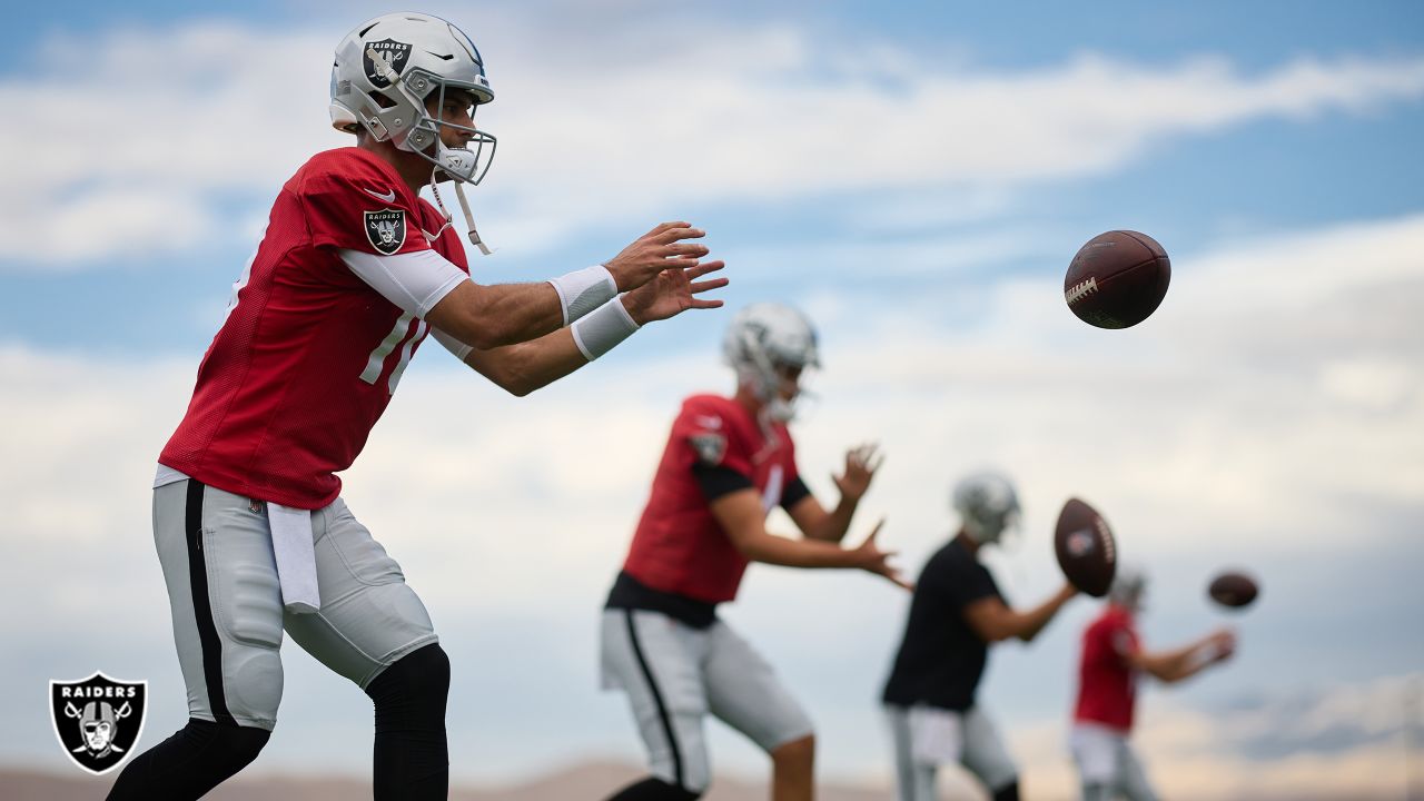 Raiders safety Trevon Moehrig (25) makes a leaping catch during a special  training camp practic …