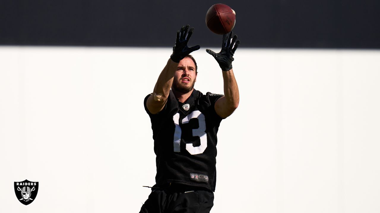 Raiders long snapper Carson Tinker (46) looks on during practice