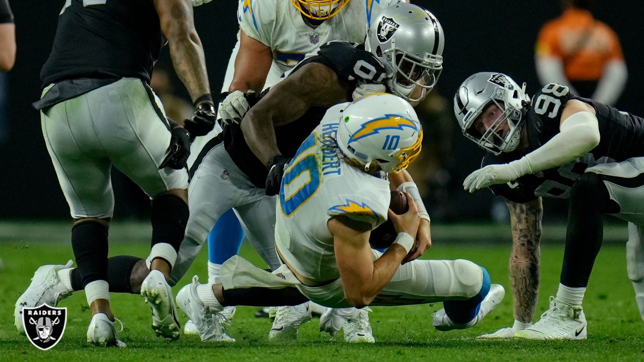 Las Vegas Raiders' Tyron Johnson (17) runs against the Los Angeles Chargers  during the first half of an NFL football game, Sunday, Jan. 9, 2022, in Las  Vegas. (AP Photo/Ellen Schmidt Stock