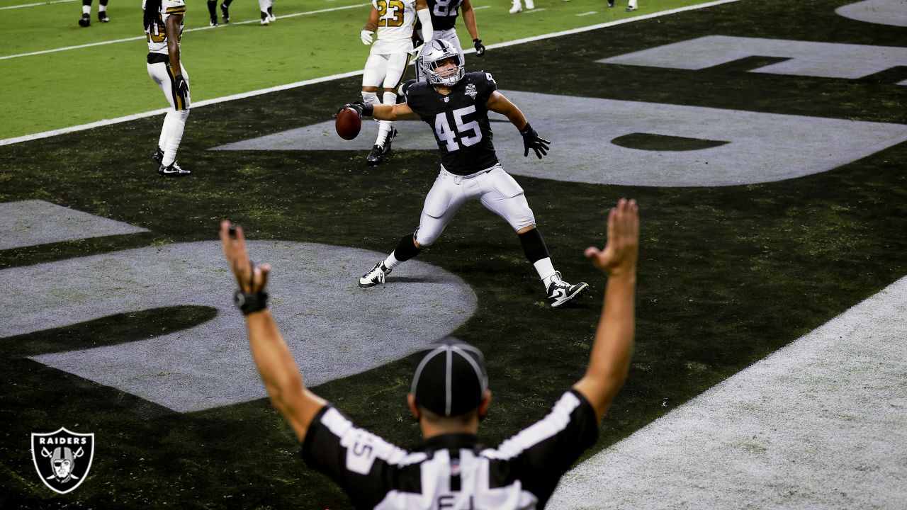 Las Vegas Raiders inside linebacker Cory Littleton (42) and Divine Deablo  (5) during the second half of an NFL football game against the Philadelphia  Eagles, Sunday, Oct. 24, 2021, in Las Vegas. (