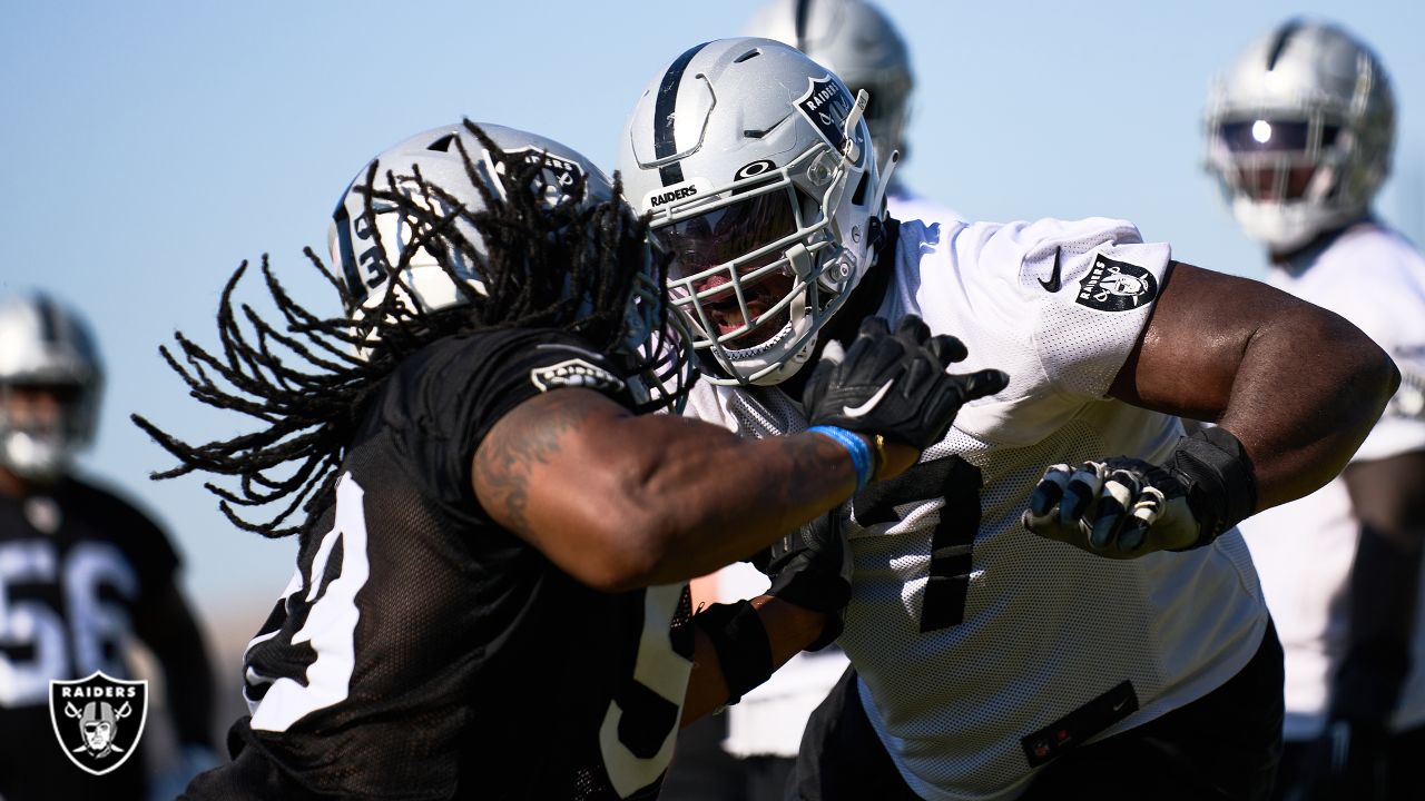 Oakland Raiders center Richie Incognito (64) waits to run a drill during a  mandatory mini-camp …