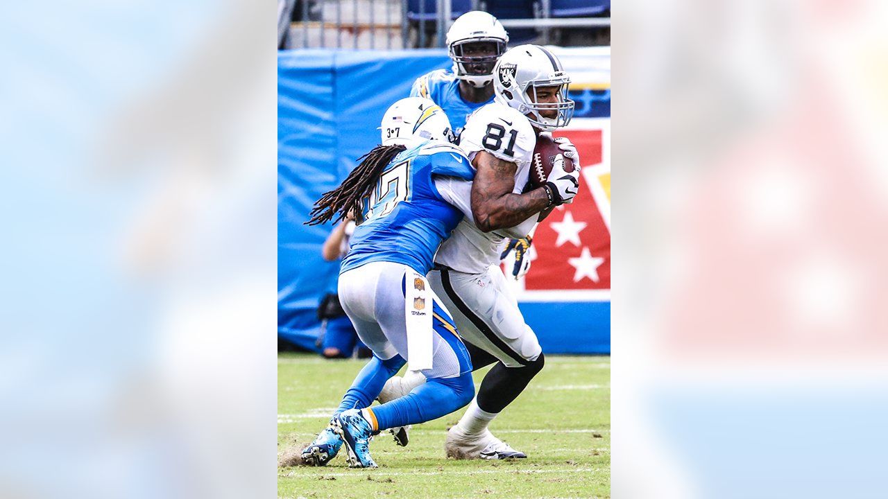 Former college roommates Khalil Mack and Brandon Oliver exchange