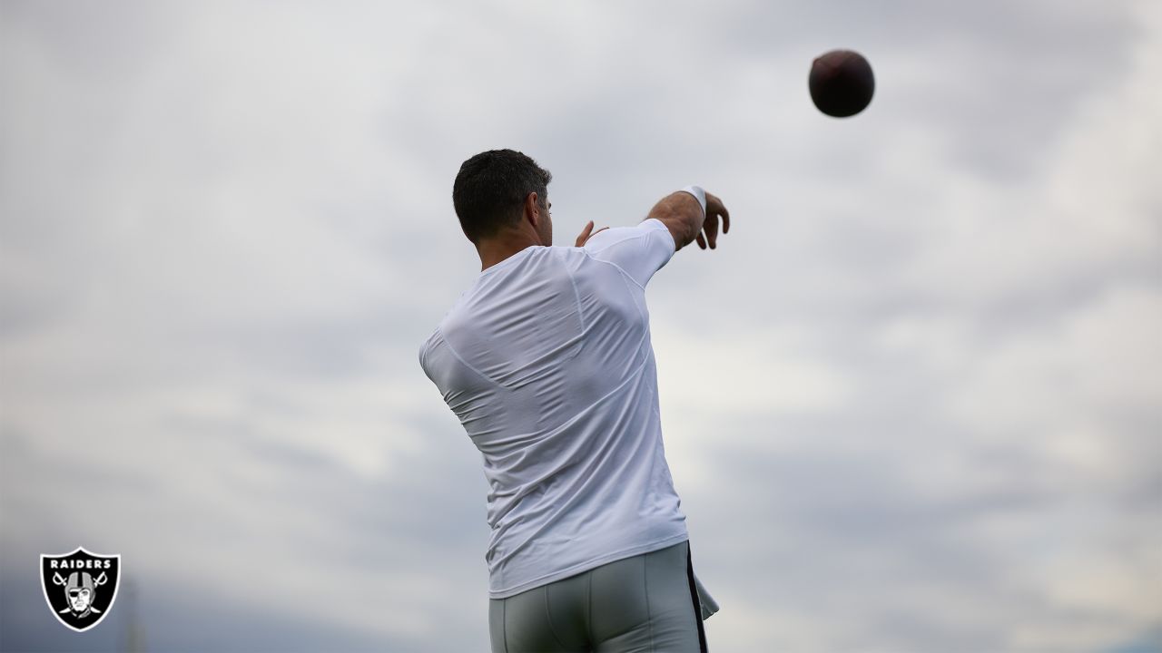 Las Vegas Raiders quarterback Chase Garbers (15) throws the ball on the  field before an NFL