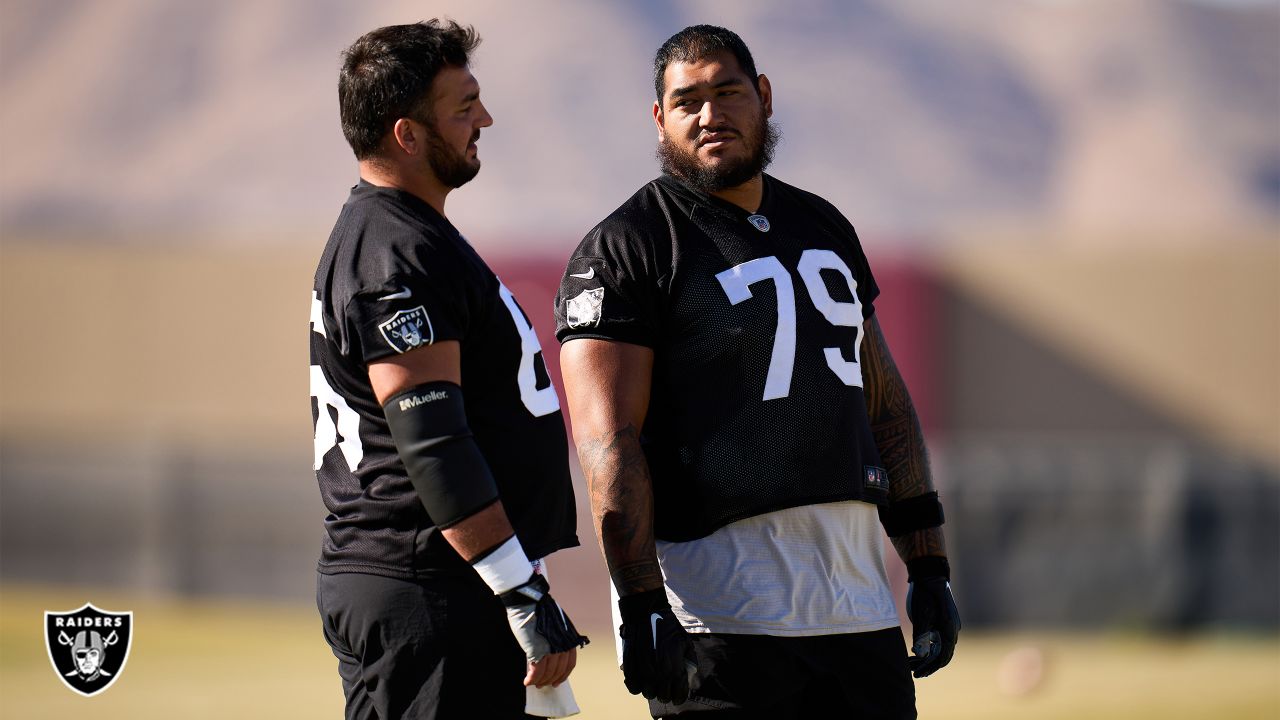 Raiders long snapper Carson Tinker (46) looks on during practice