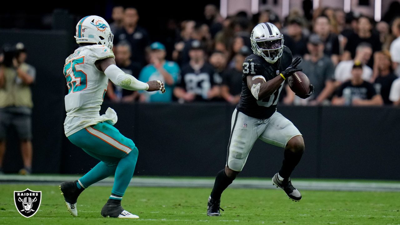 Las Vegas Raiders running back Peyton Barber (31) is tackled by