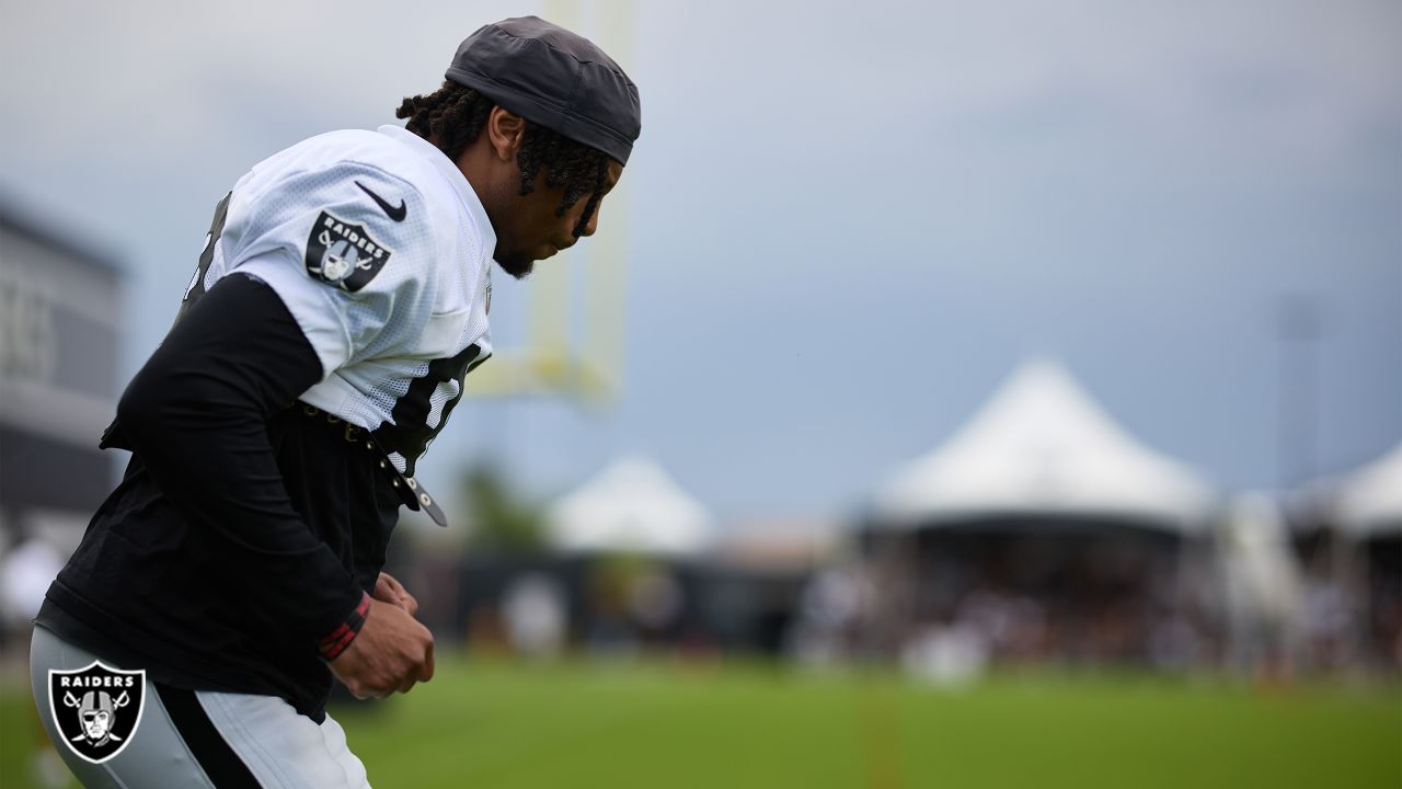 Raiders safety Trevon Moehrig (25) makes a leaping catch during a special  training camp practic …