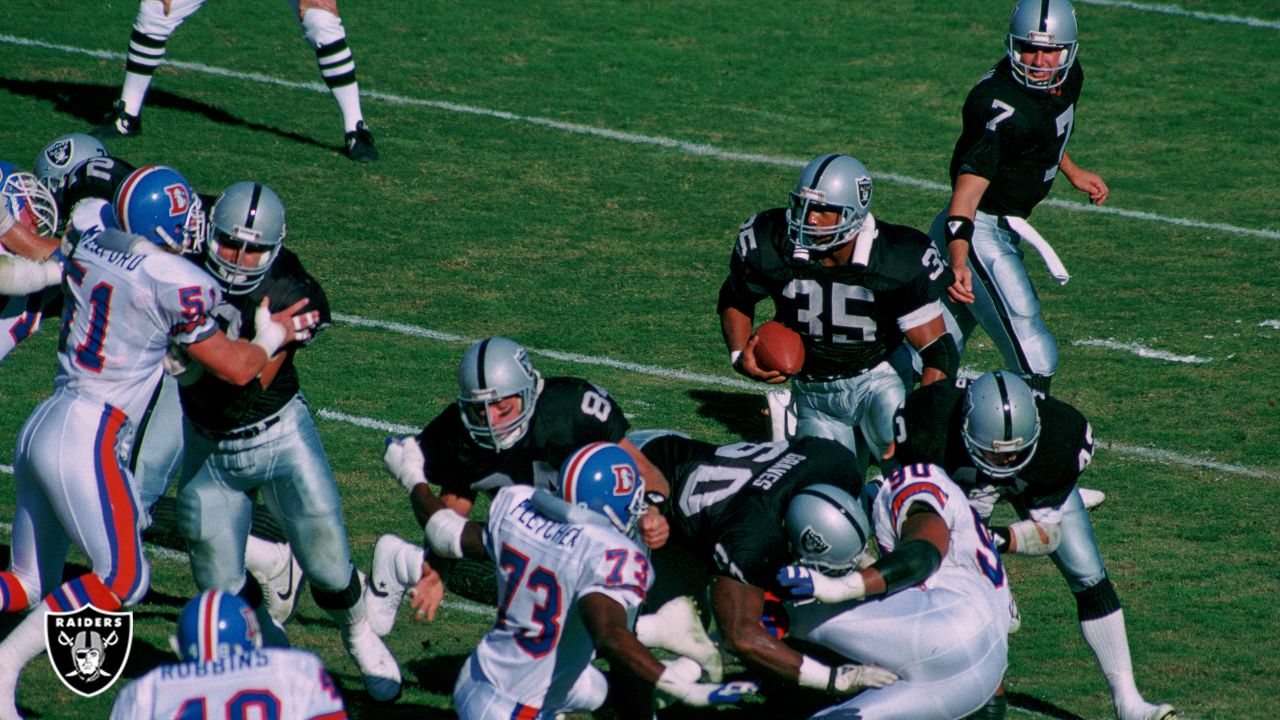 Los Angeles Raiders' Howie Long (75) takes down Green Bay Packers Randy  Wright in Los Angeles, in this September 9, 1984 photo. Long will be  inducted into the Pro Football Hall of