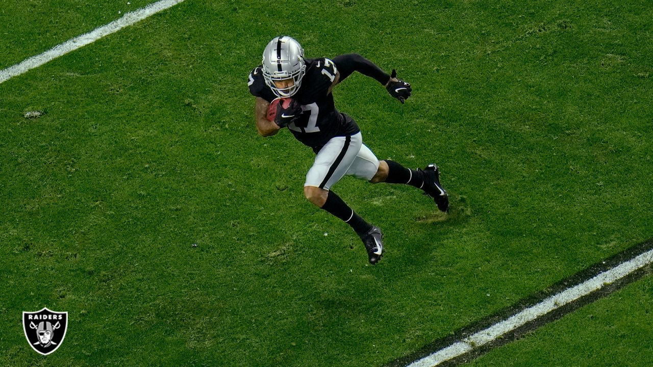 Raiders wide receiver Tyron Johnson (17) celebrates as time