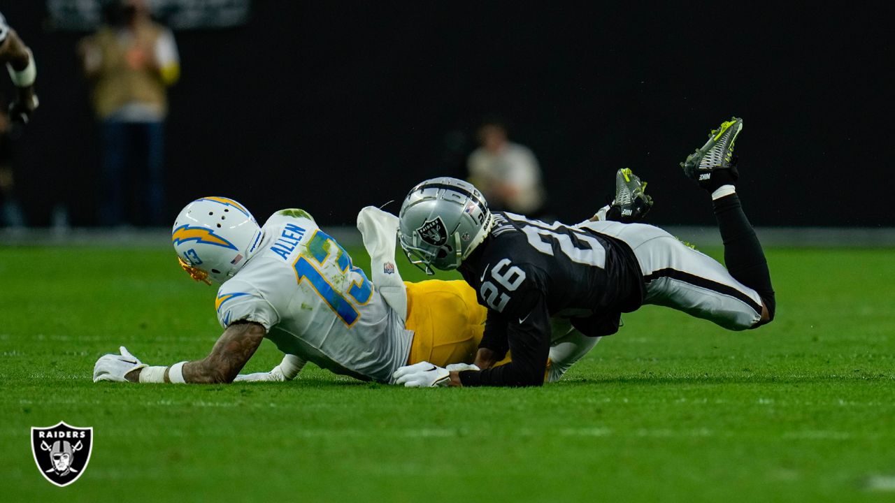 Los Angeles Chargers tight end Tre' McKitty (88) is tackled by Las Vegas  Raiders cornerback Nate Hobbs (39) during the first half of an NFL football  game, Sunday, Dec. 4, 2022, in