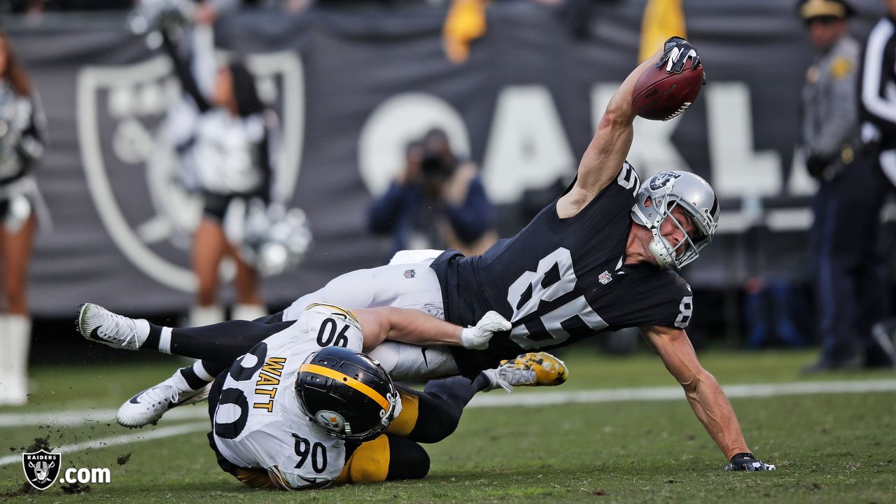 Oakland Raiders tight end Derek Carrier (85) scores a touchdown as Arizona  Cardinals defensive …