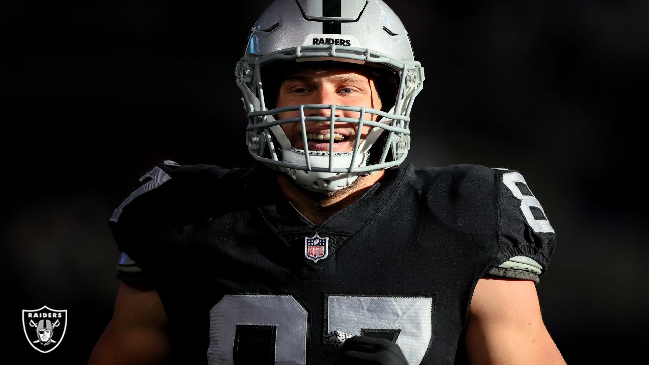 Las Vegas Raiders quarterback Aidan O'Connell (4) gestures as he warms up  before the first half of a preseason NFL football game against the Dallas  Cowboys in Arlington, Texas, Saturday, Aug. 26