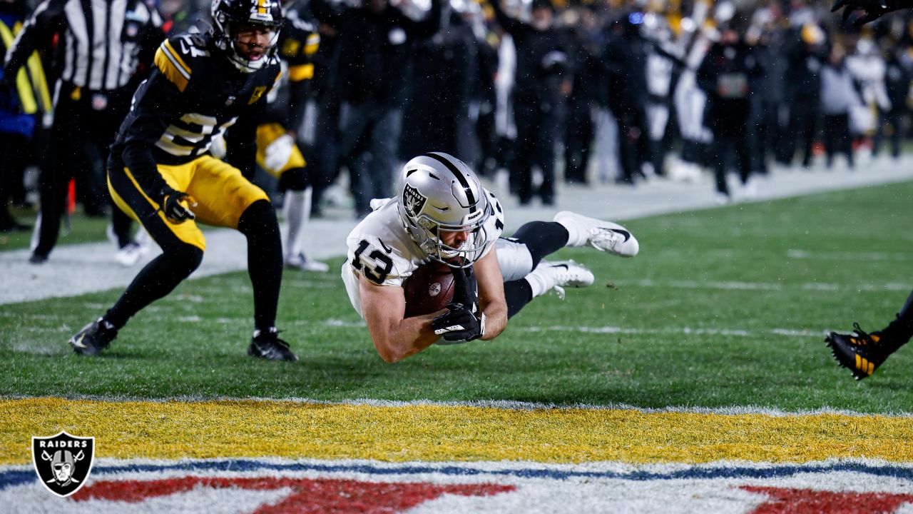 Pittsburgh Steelers wide receiver George Pickens (14) heads for the end  zone on a 71 yard touchdown catch from quarterback Kenny Pickett during an  NFL football game against the Cleveland Browns in