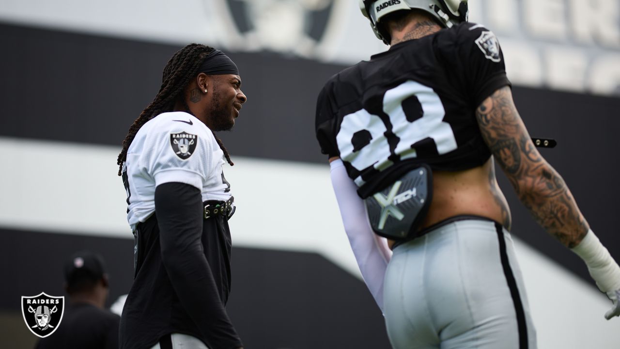 Raiders safety Trevon Moehrig (25) makes a leaping catch during a special  training camp practic …